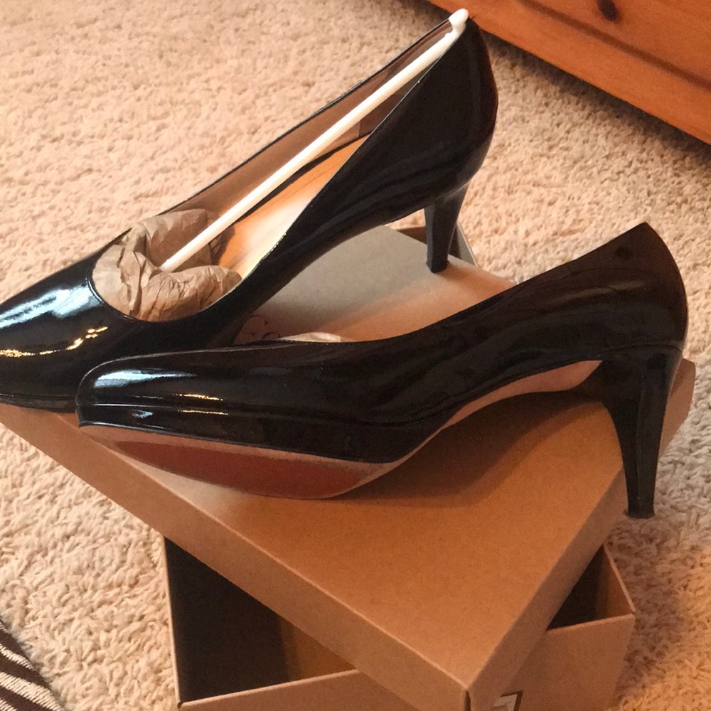 Black patent leather pumps